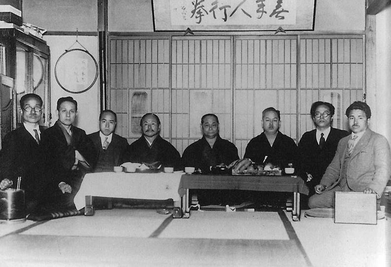 Masters of karate in Tokyo (c. 1930s), from left to right, Kanken Toyama, Hironori Otsuka, Takeshi Shimoda, Gichin Funakoshi, Chōki Motobu, Kenwa Mabuni, Genwa Nakasone, and Shinken Taira.